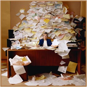 Lady with pile of paper
